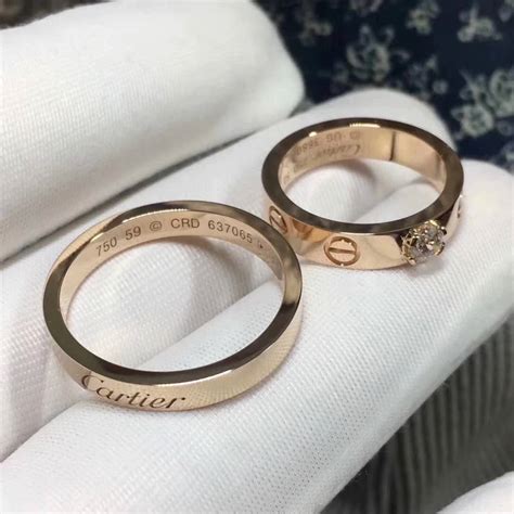 cartier wedding rings couple.